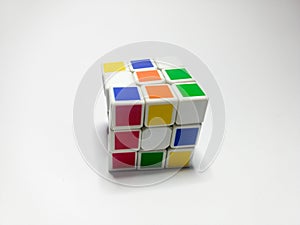 Close up of rubik`s cube isolated on white background