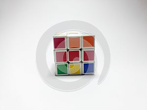 Close up of rubik`s cube isolated on white background