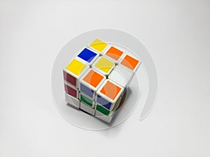 Close up of rubik`s cube isolated on white background