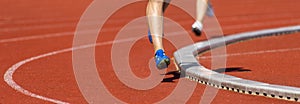 Close up of runners feet on the track field