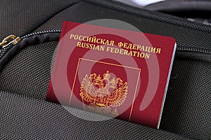 Close up of Russia Passport in Black Suitcase Pocket