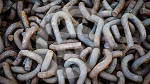 Close up of rusted metal chains, Rusty Chain Images,Chains of the past pile up in a heap, Brown metal chains with rust n ground,