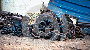 Close up of rusted metal chains, Rusty Chain Images,Chains of the past pile up in a heap, Brown metal chains with rust n ground,