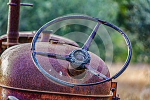 Close-up of rusted tractor steering wheel