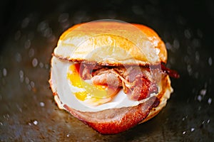 Rustic bacon egg breakfast sandwich bun