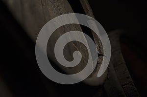 Close-up of a rustic brown wooden oak barrel in Budapest, Hungary. Used for maturing and storing alcoholic beverages like wine and