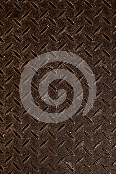 Close-up of rusty corrugated steel sheet texture. Lentil pattern corrugation.