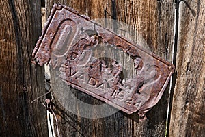 Close up of a 1924 rusty license plate