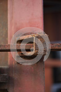 Close up of rusty metal closure device with pal