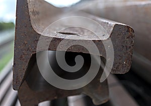 Close up of rusty old steel rails.