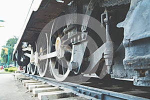 Close up of the rusty wheel train on the railway track