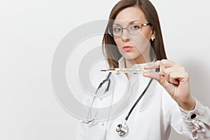 Close up sad doctor woman in medical gown with stethoscope, glasses. Focus on clinical thermometer with high fever