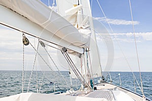 Close up of sailboat mast or yacht sailing on sea