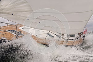 Sailing Boat Yacht in Rough Sea Waves