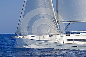 Close-up of a sailing yacht in action