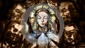 Close up of Saintly Figure in Stained Glass
