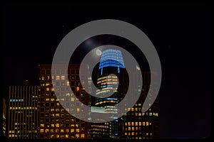 Close up of Salesforce tower san francisco with moon, night time