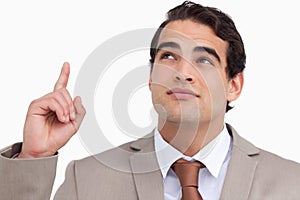 Close up of salesman looking and pointing up