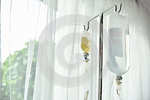 Close up saline IV drip. photo