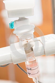 Close up saline IV drip for patient and Infusion pump in hospital