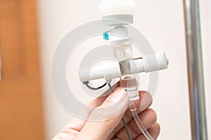 Close up saline IV drip for patient and Infusion pump in hospital