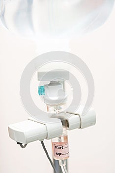 Close up saline IV drip for patient and Infusion pump in hospital