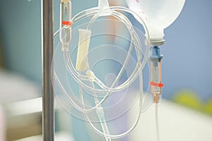 Close up saline IV drip for patient and Infusion pump in hospital