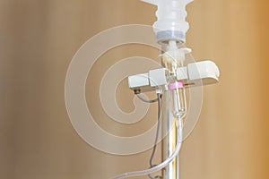 close up of saline solution on hand of man patient lying on the