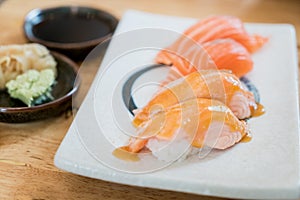 Close up salmon burned top with mayo in plate. Healthy Japanese