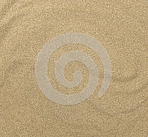 Close up of sand texture. Brown sand. Background from fine sand