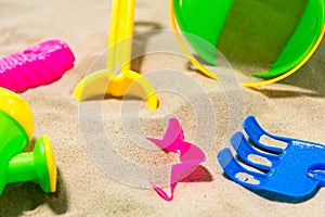 Close up of sand toys kit on summer beach