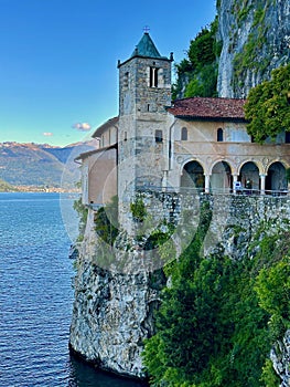 Close-Up of Santa Caterina del Sasso Hermitage Tower and Archways on the Cliffside Overlooking Lake Maggiore photo
