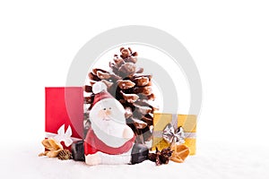 Close up of Santa sitting on wooden horse sledge holding gift an