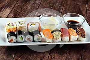 close up of sashimi sushi set with chopsticks and soycus photo