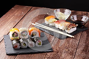 close up of sashimi sushi set with chopsticks and soy photo