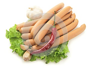 Close up of sausage and fresh vegetables