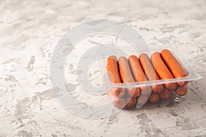 Close-up of sausages. Sausages in plastic and place for text. Boiled raw bavarian sausages and copy space