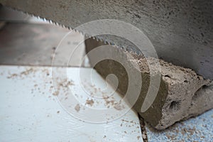 close up saw blades cutting concrete