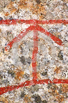 Close up of the Scandinavian rune Tyr from an ancient runestone