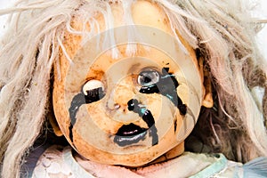 Close up of scary baby doll of halloween