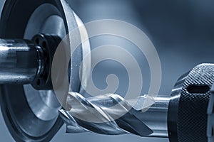 Close up scene the flat end mill tool regrinding process on regrinding machine