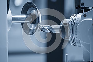 Close up scene the flat end mill tool regrinding process on regrinding machine