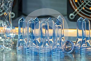 The close up scene of group of preform shape of PET bottle products