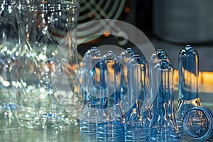 The close up scene of group of preform shape of PET bottle products