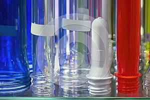 Close up scene of group of preform shape of PET bottle products