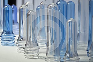 Close up scene of group of preform shape of PET bottle products