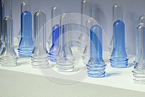 Close up scene of group of preform shape of PET bottle products