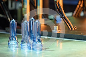 Close up scene of group of preform shape of PET bottle products