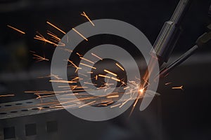 Close up scene the laser welding process by automatic system