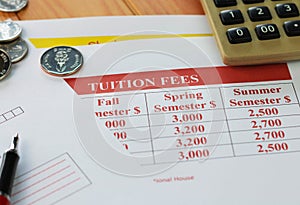 Close up school tuition fees on wooden table